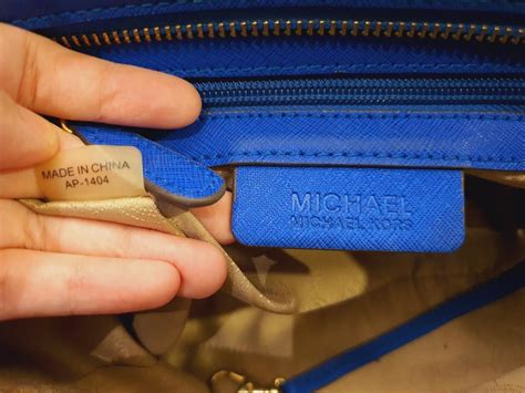 how to tell if a michael kors purse is real|Michael Kors serial number lookup.